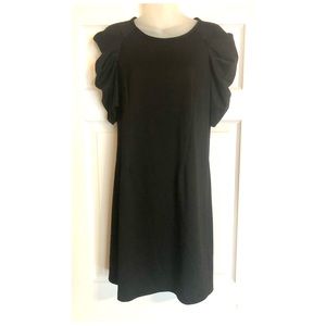 Thread Little Black Dress with Amazing Sleeve Detail. Simple but Elegant.